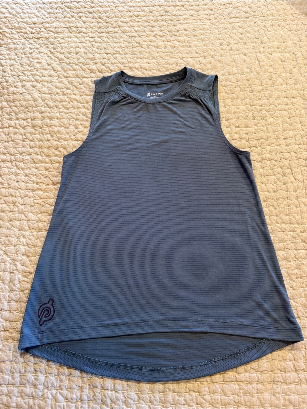 BOGO 1/2 off all Peloton items. Higher price prevails. Peloton Tank.